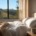 Restful bedroom with herbal tea and hillside view at a private center for benzo detox in Los Angeles