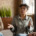 A woman sitting in a group and talking for the topic best inpatient rehab california.