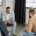 A group of men talking in a group therapy session for the topic best rehab centers for men.