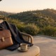 Briefcase and suit jacket on a hillside terrace chair, representing rehab for professionals in Los Angeles