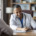 A doctor smiling while talking with a patient for the topic best alcohol addiction treatment centers.